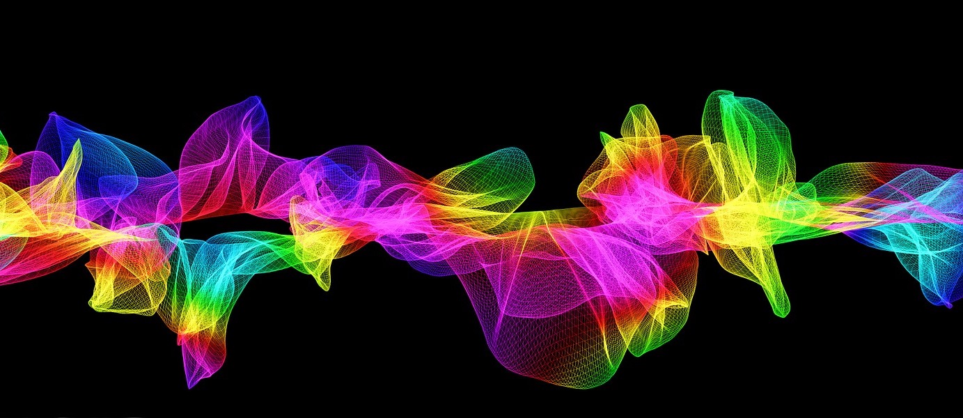 An abstract light-trail mesh in the full McAfee palette — red through orange, yellow, green, cyan, blue and purple — rippling across black.